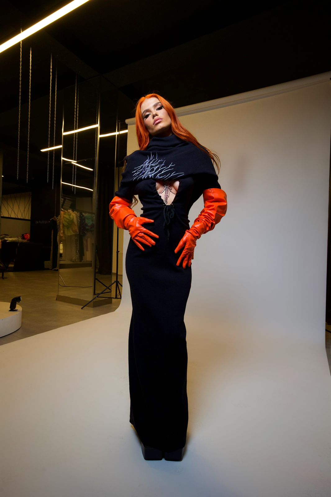 Black Stretched Dress & Orange Gloves