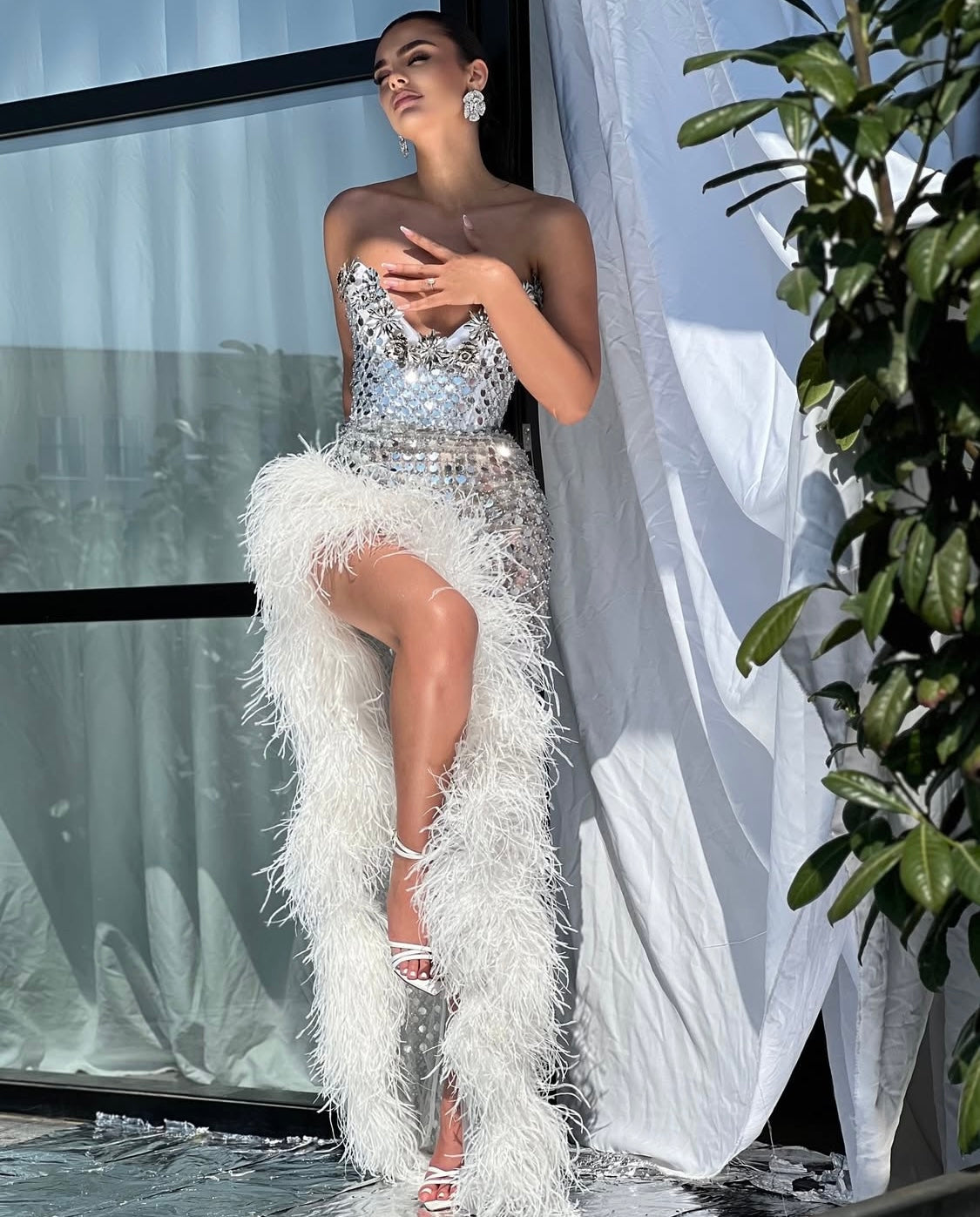 Silver Sequin Gown with Feather Slit Dona Matoshi Silver Sequin Gown with Feather Slit Dona Matoshi